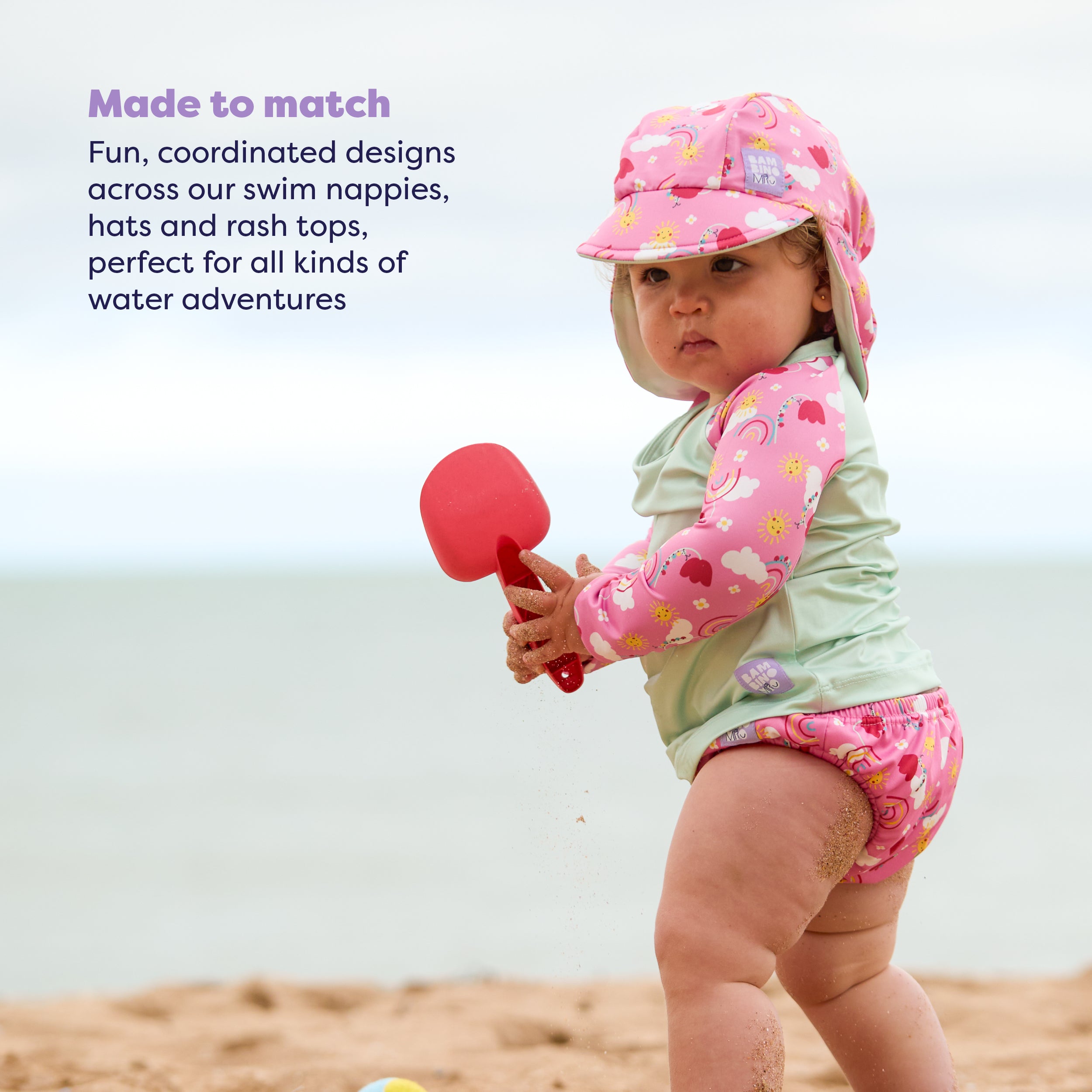 UPF 40+ Reversible Swim Hat for Babies and Toddlers in Happy Days - NEW! - Bambino Mio (UK)