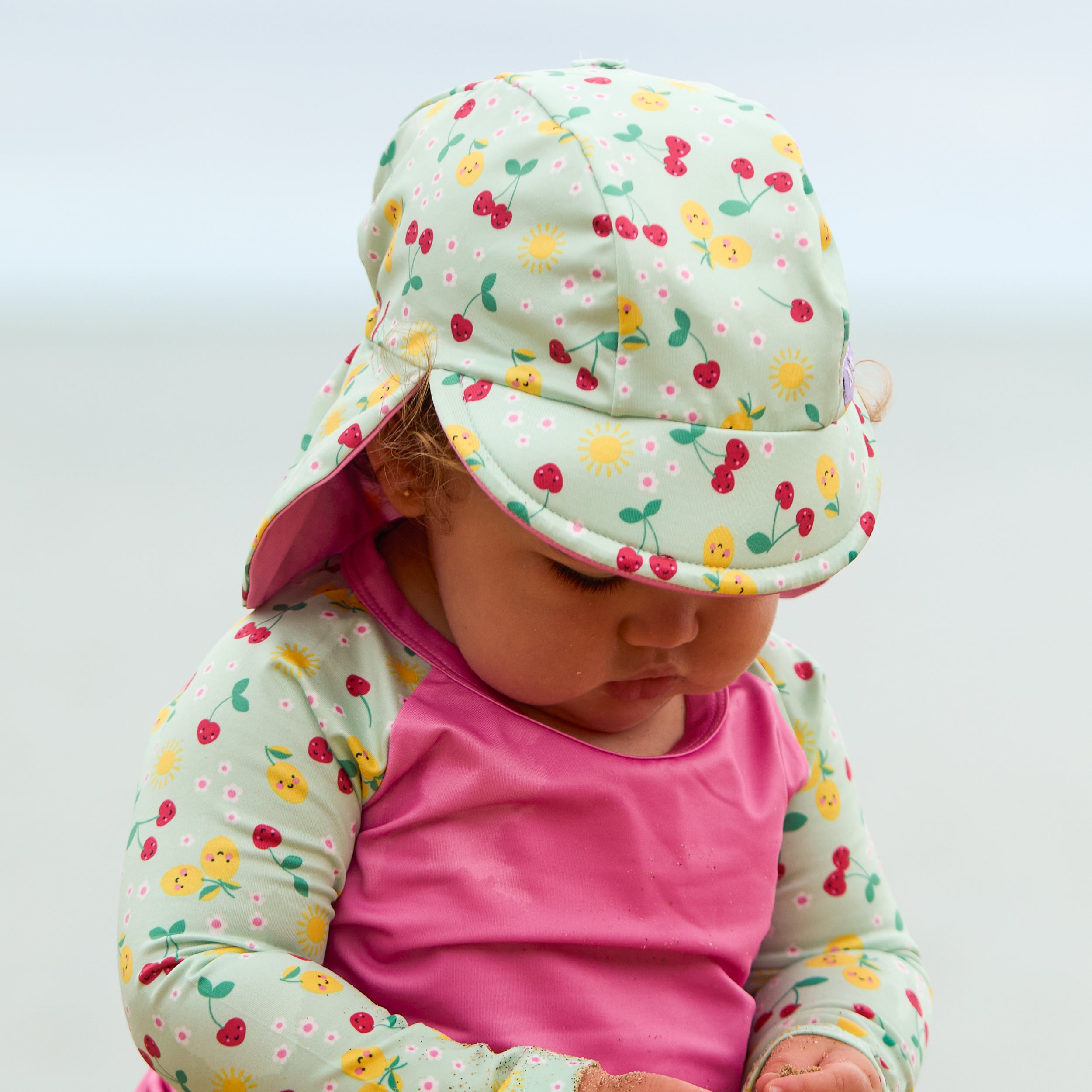 UPF 40+ Reversible Swim Hat for Babies and Toddlers in Juicy Fruit - NEW! - Bambino Mio (UK)
