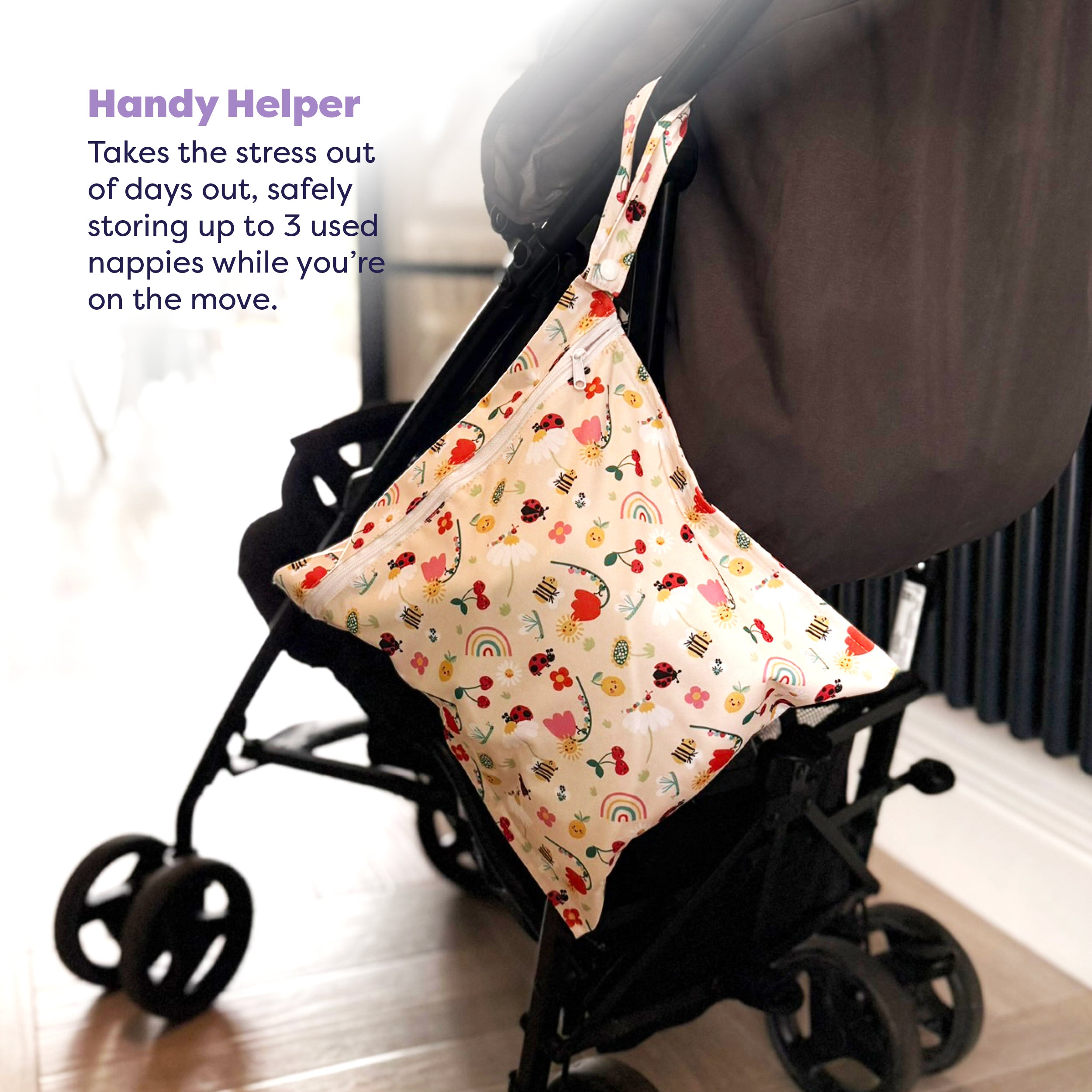 Out and About Waterproof Wet Nappy Bag in Sunshine Friends - Bambino Mio (UK)