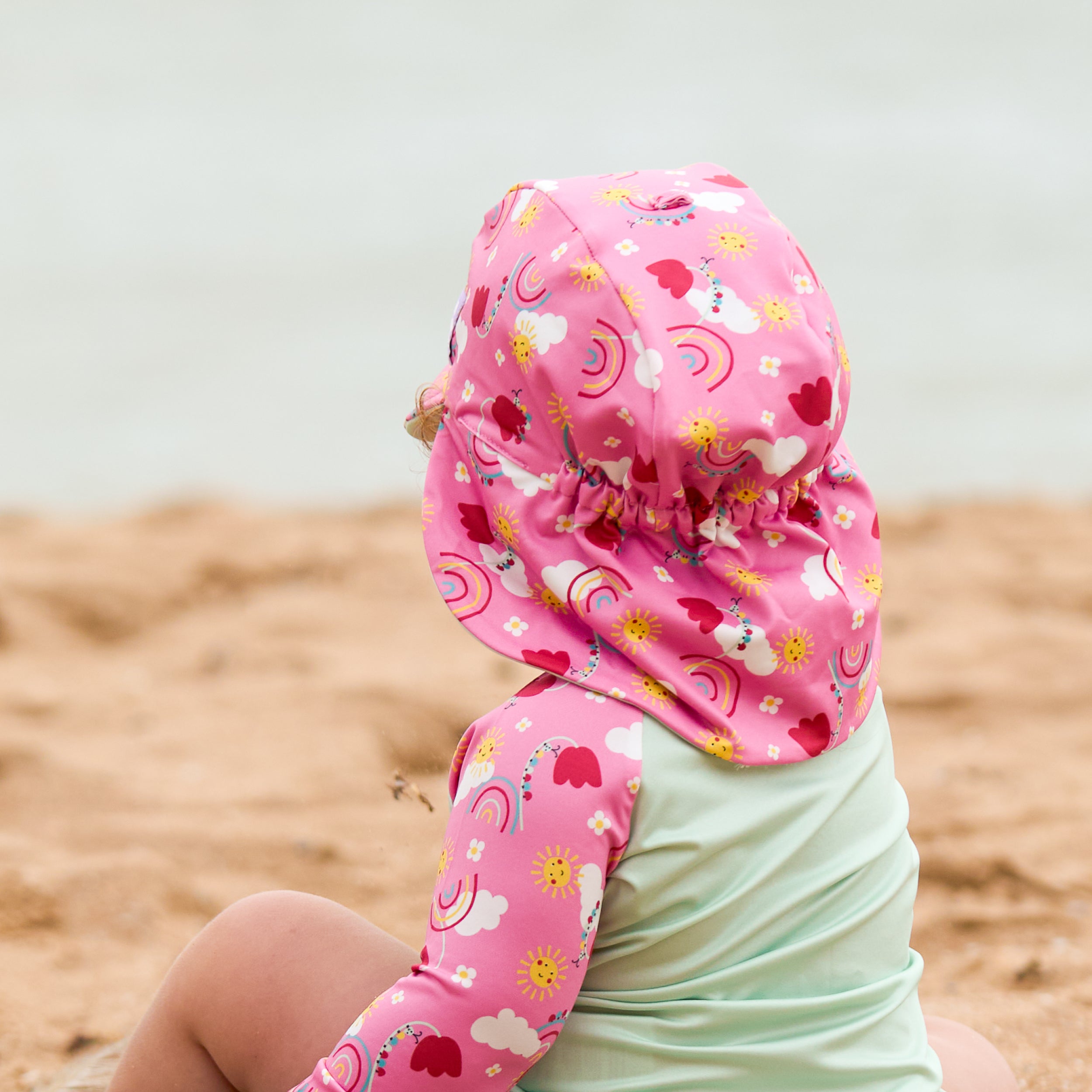 UPF 40+ Reversible Swim Hat for Babies and Toddlers in Happy Days - NEW! - Bambino Mio (UK)